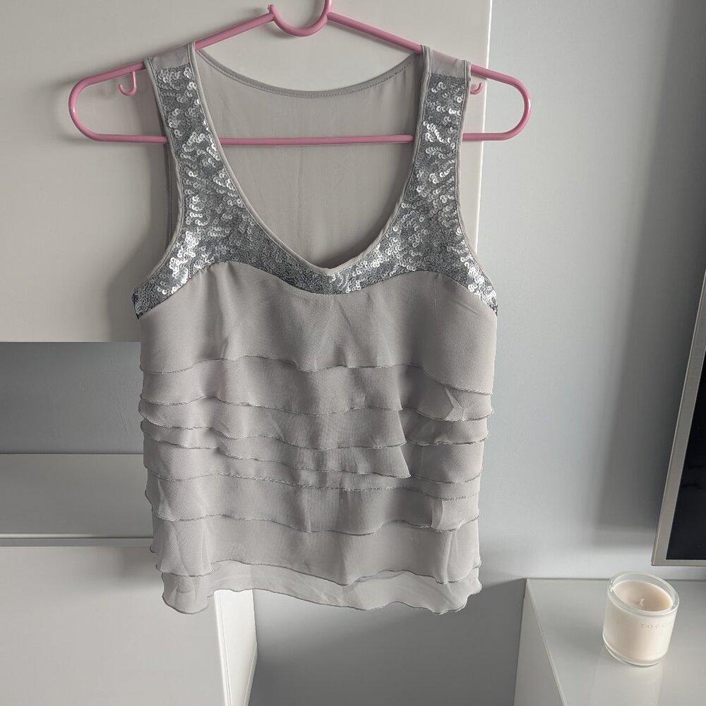 Ruffled sequence sleeveless top